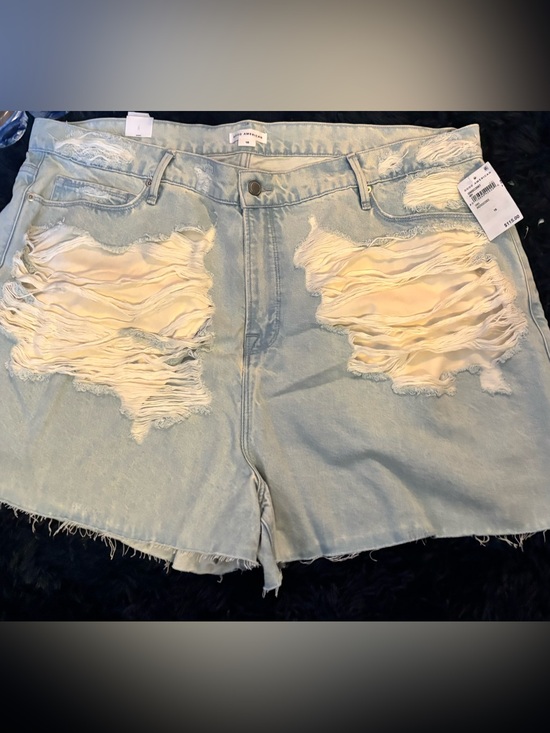 Good American Pants - Good American Light Wash Distressed Jean Shorts with Cream Underlay